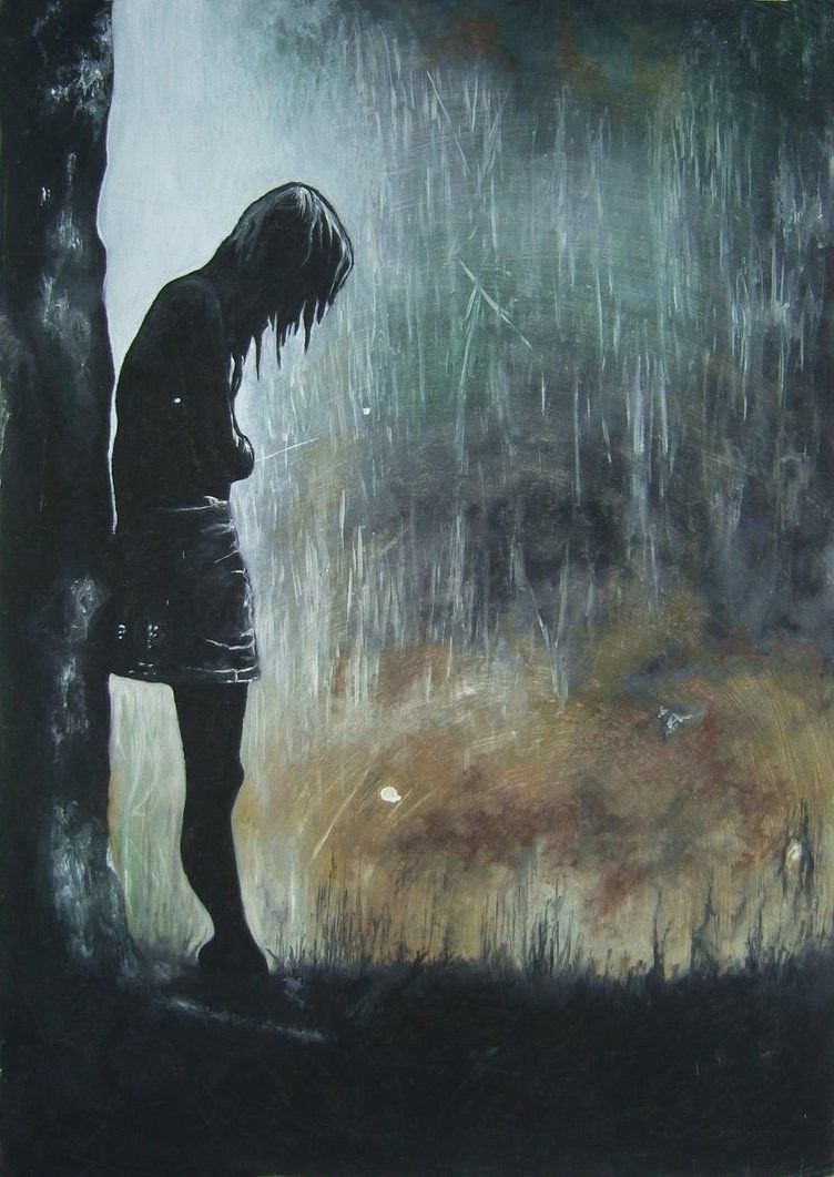 cô gái buồn dựa tường đứng dưới mưa