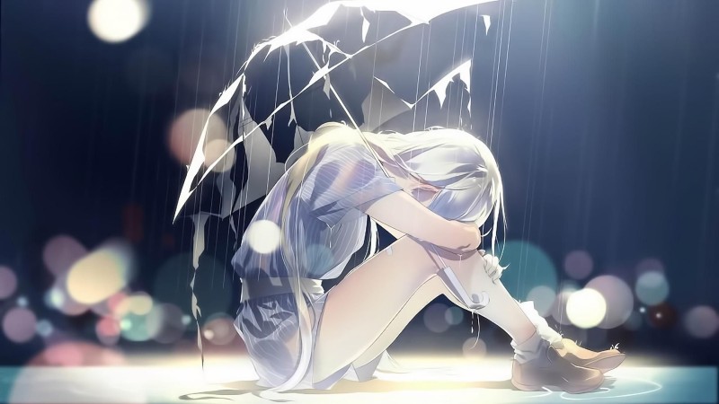 con gái buồn tủi thân cô đơn dưới mưa